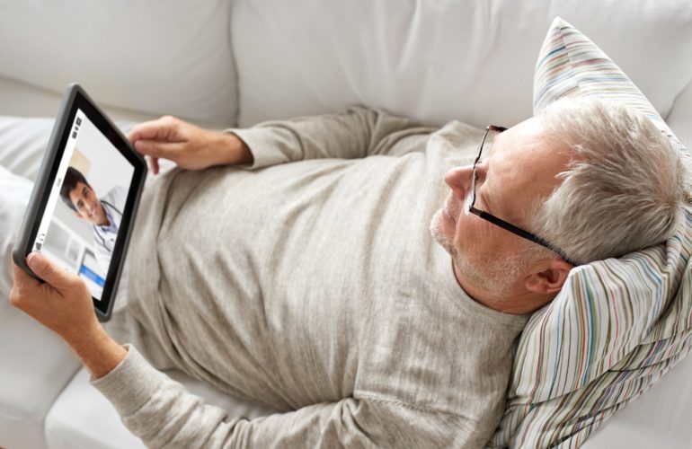 Older person using tablet