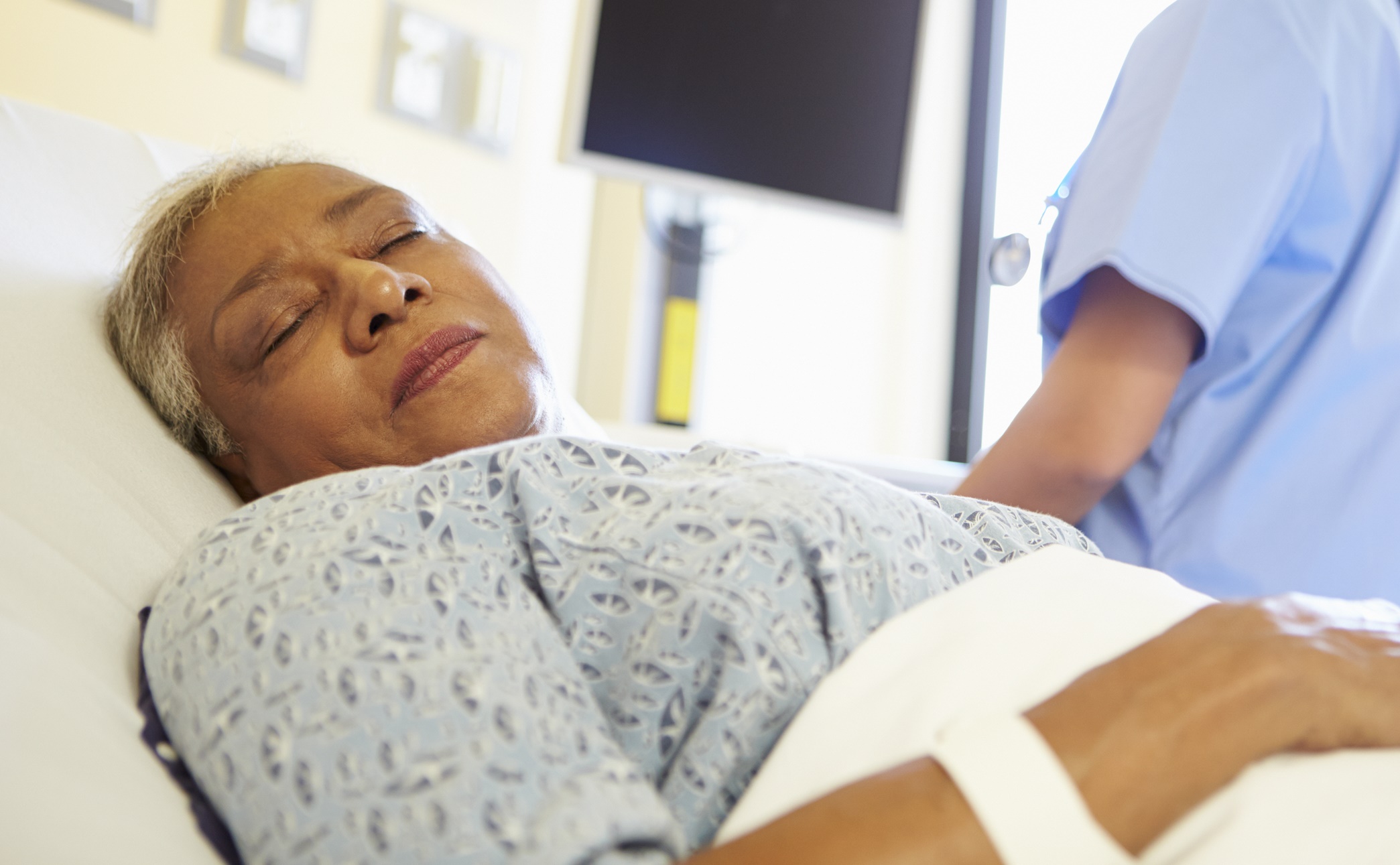Woman in hospital bed