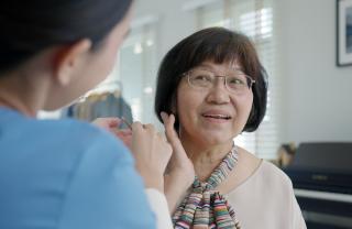 A woman receiving care and support