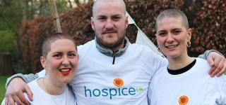 Photo of three people who braved a headshave for Hospice UK