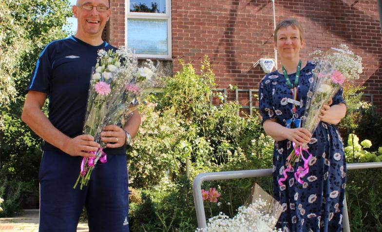 John Mozley, 74, receives flowers Treetops Hospice Care.
