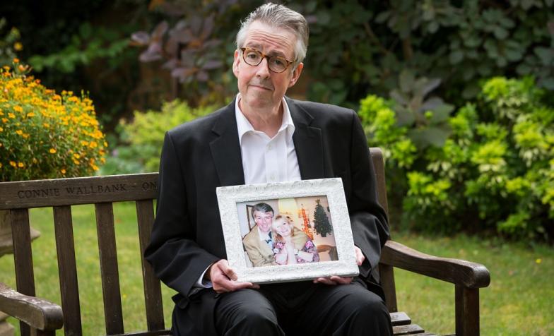 Adam Watkinson holding picture