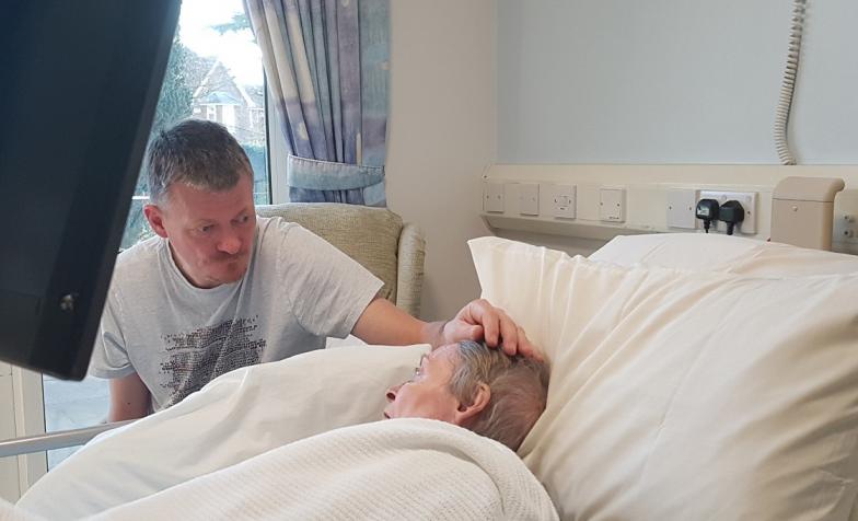 Tricia Sanchez in hospice bed