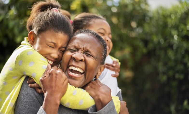 Woman laughing with her children