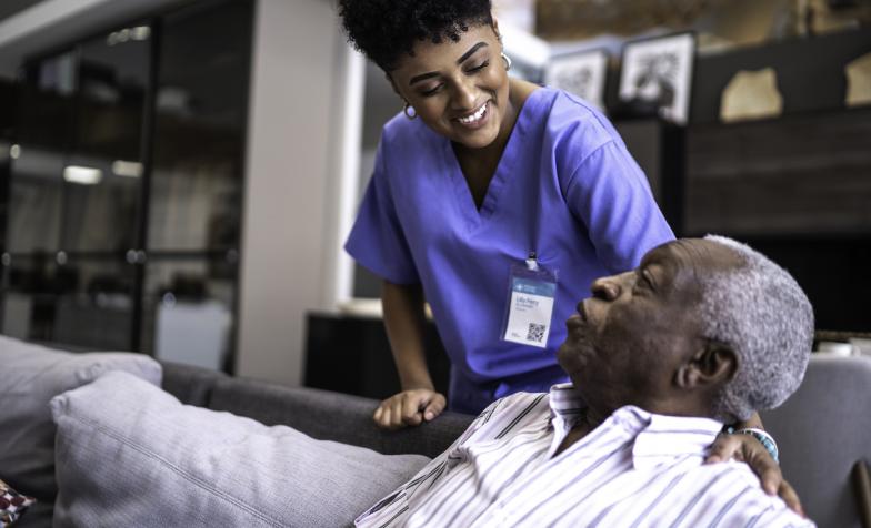 Female nurse taking care of a senior man