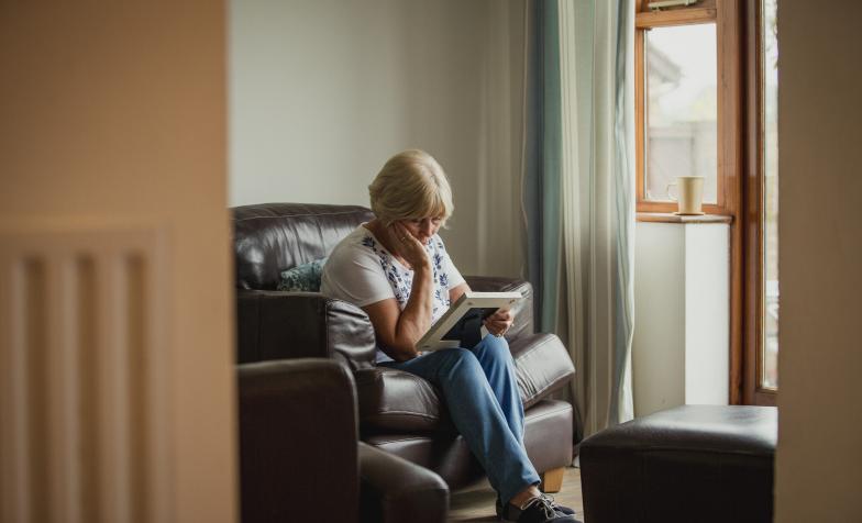 Woman looking at photo