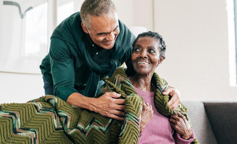 Man caring for older woman