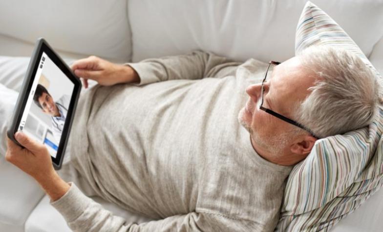 Older person using tablet