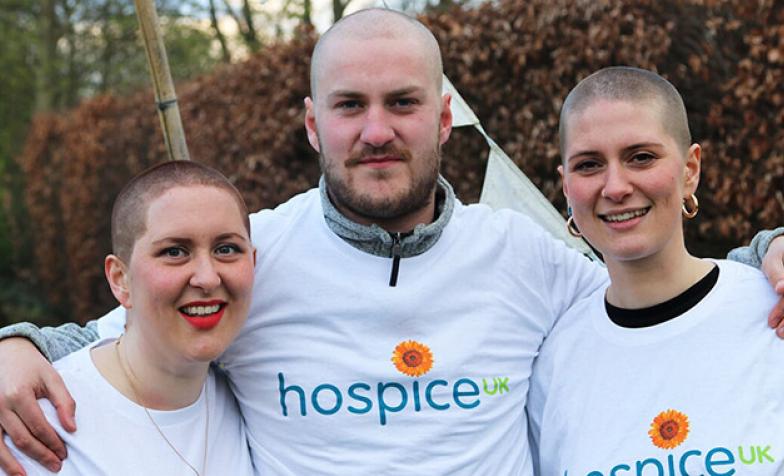 Photo of three people who braved a headshave for Hospice UK