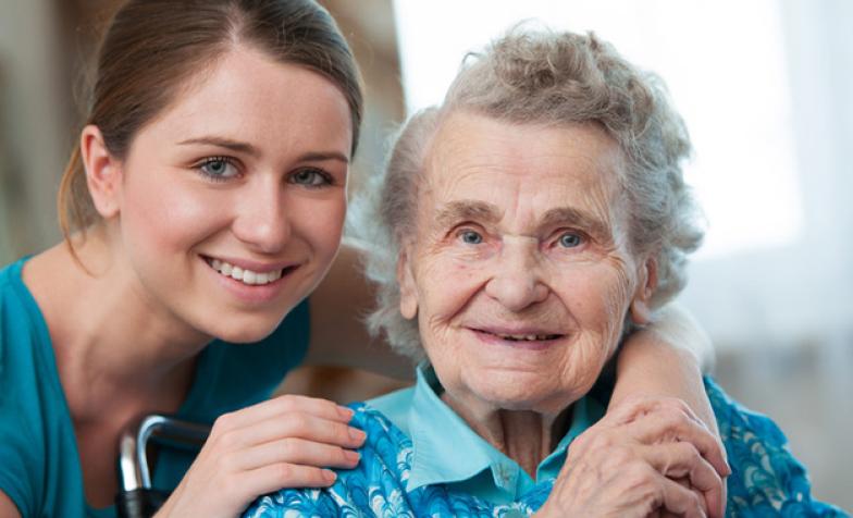 A stock image of a carer looking after someone