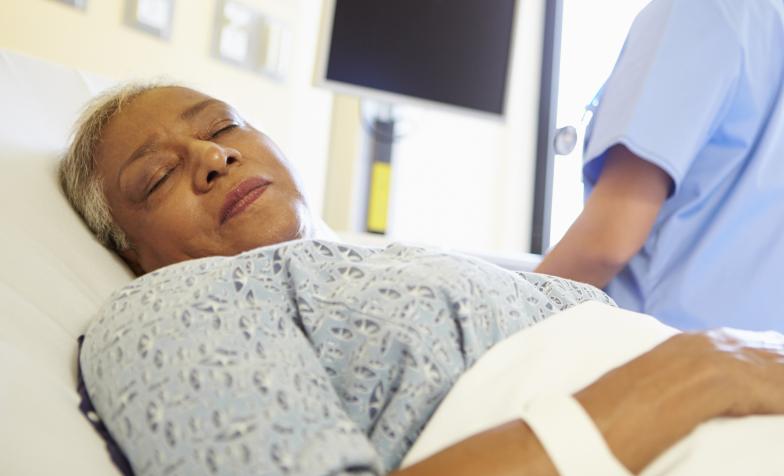 Woman in hospital bed