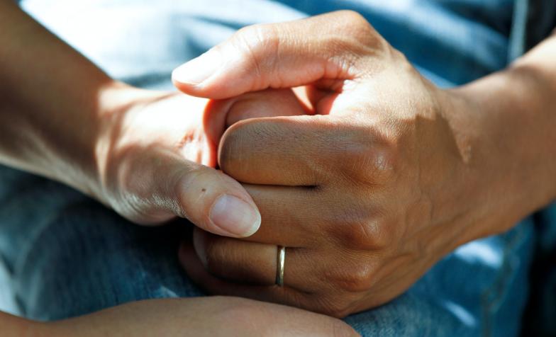 Two hands being held