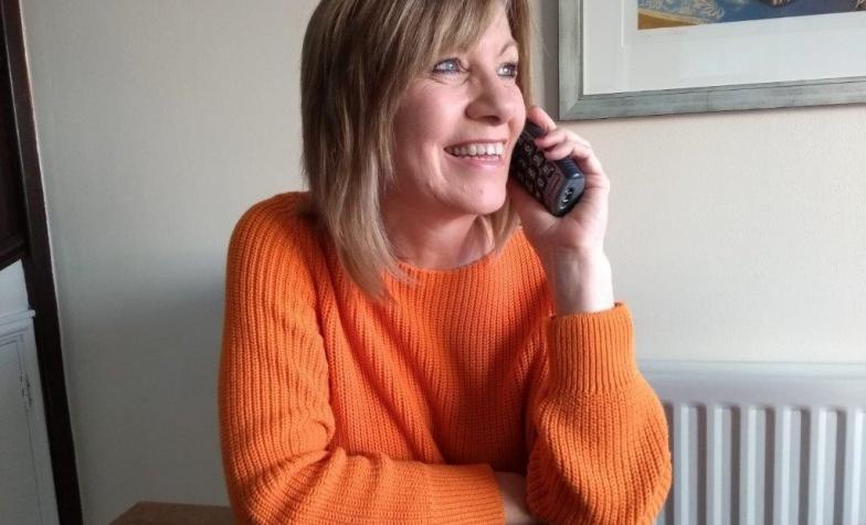 Stock photo of woman talking on phone