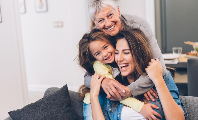 Three generations of a family sharing a moment together