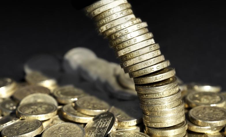 Images of coins falling down