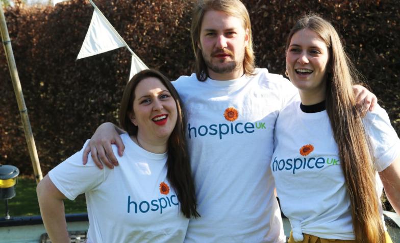 Fundraisers stand together