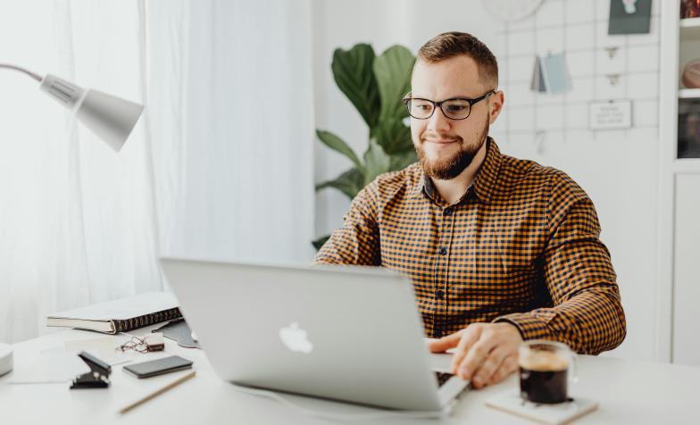 man working at laptop