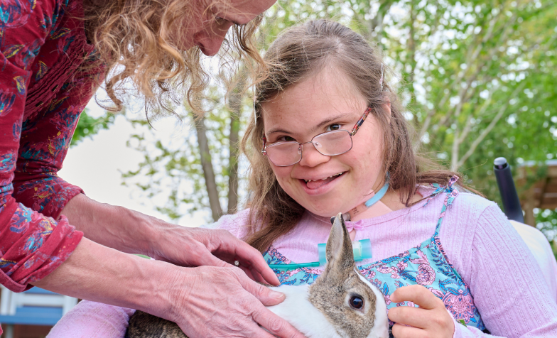 children's hospice patient holding rabbit