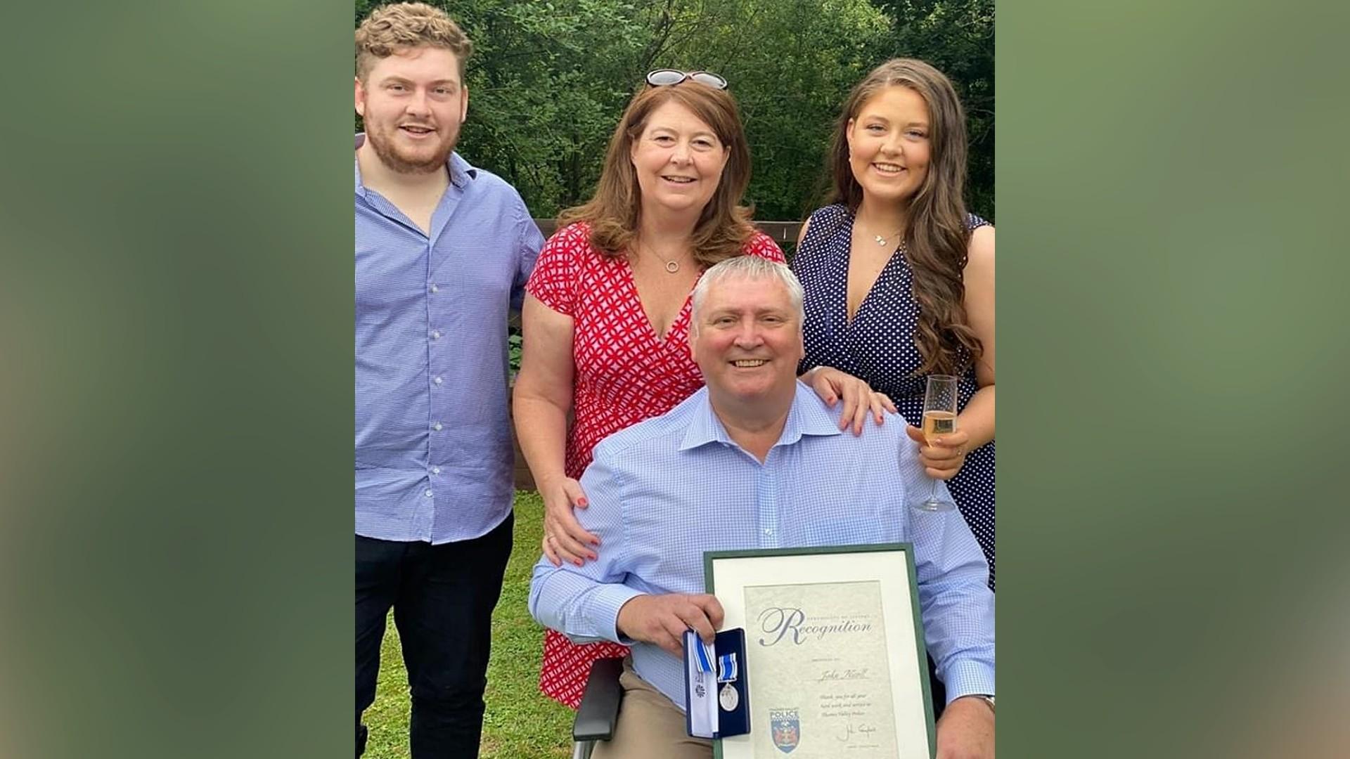 John with his long service award