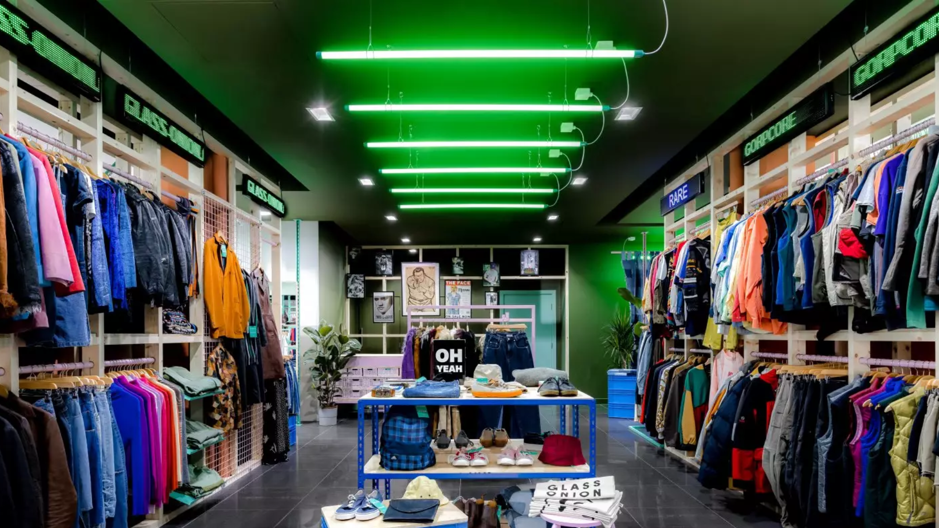 A clothing store filled with rails of clothing items