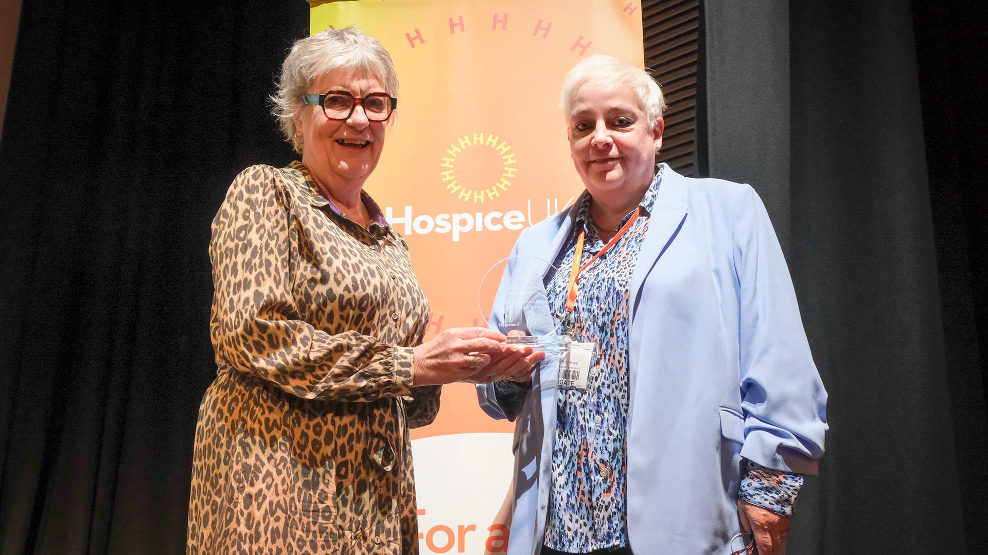Sophie Andrews OBE, Chief Executive of Noah's Ark Children's Hospice, receives the Michael Howard Hospice Team of the Year award 2024