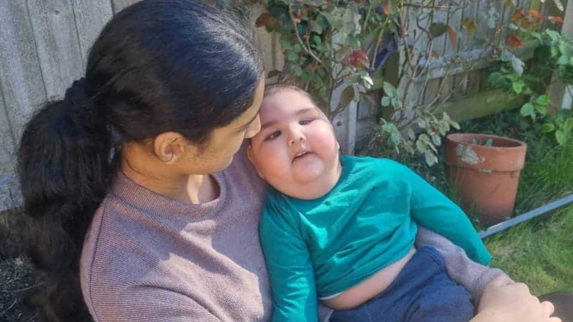 Childrens hospice patient and his mum