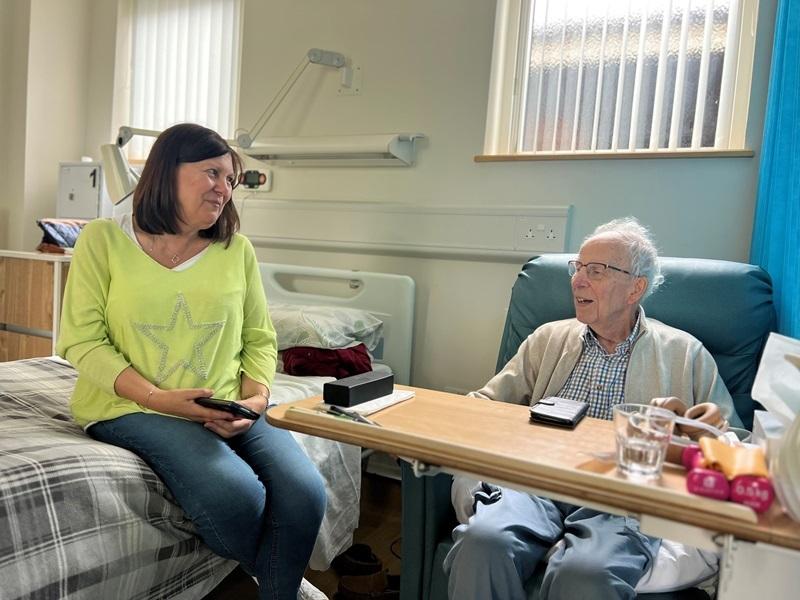 Roger and daughter in the inpatient unit at garden house hospice