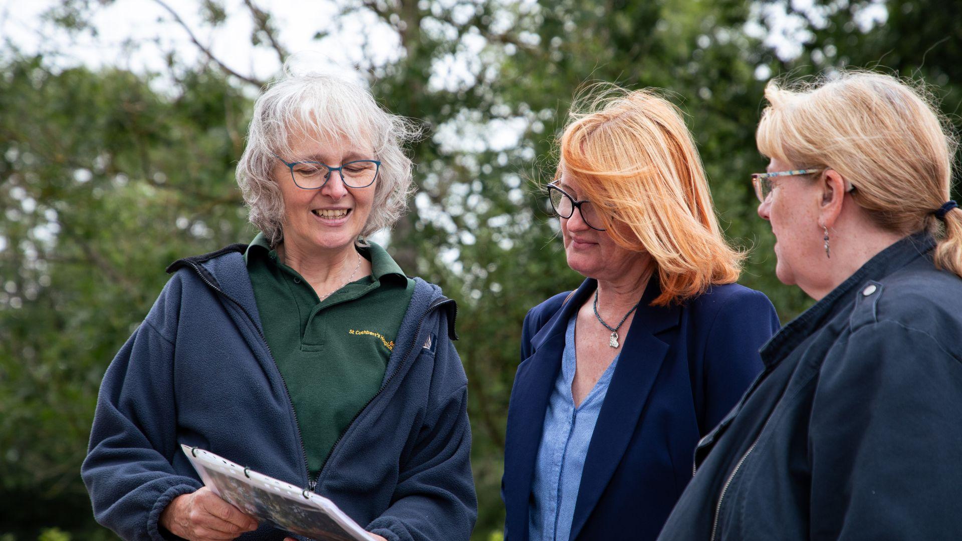 Opening the door to the hospice - volunteers at St Cuthbert's open garden tell people about hospice care, and can recruit new volunteers