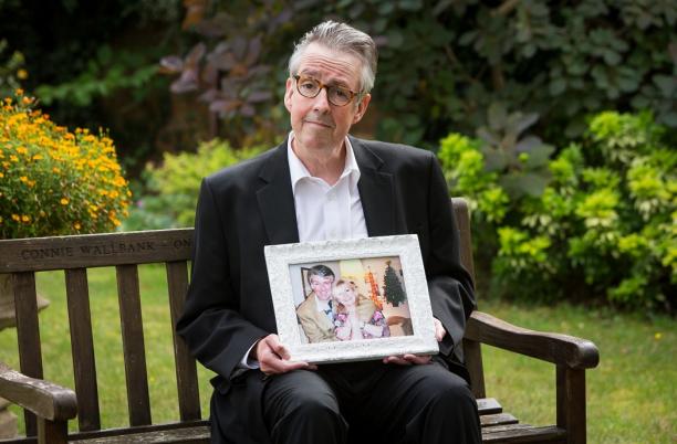Adam Watkinson holding picture