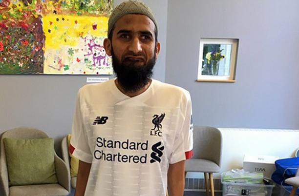 Wasim, a patient at East Lancashire Hospice, who has MND