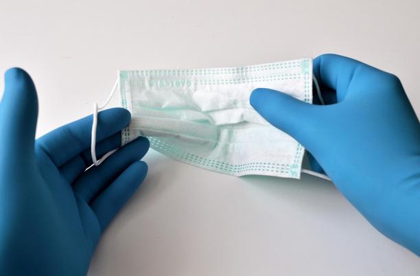 A stock image from Pixabay of protective gloves and a facemask