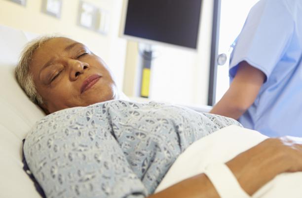 Woman in hospital bed