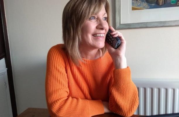 Stock photo of woman talking on phone