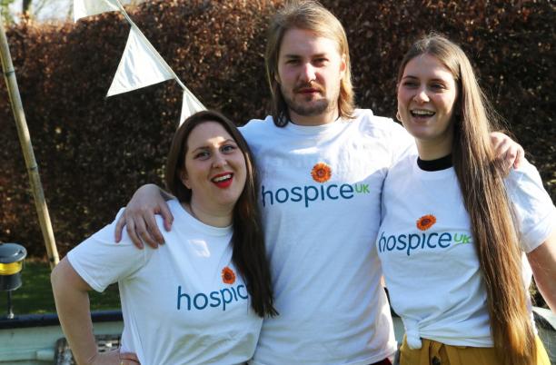 Fundraisers stand together