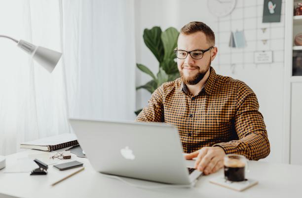 man working at laptop