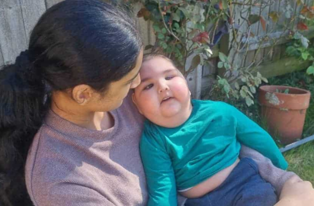Childrens hospice patient and his mum