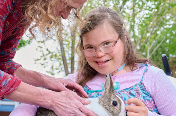 children's hospice patient holding rabbit