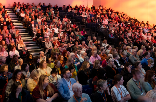 An auditorium full of people