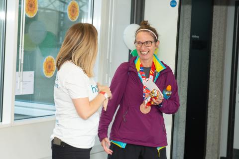 Team Hospice UK, staff and volunteers at London Marathon post-race reception.