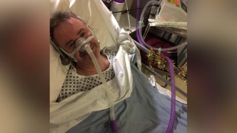 Alan on a ventilator at the hospice, treating him for Motor Neurone Disease