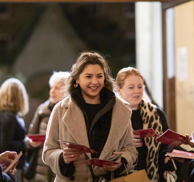Carol Service entrance, guests walking in 