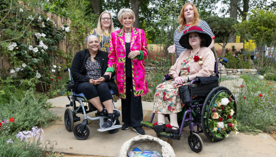 Patients from St Christopher's Hospice isiting the Hospice UK Garden of compassion